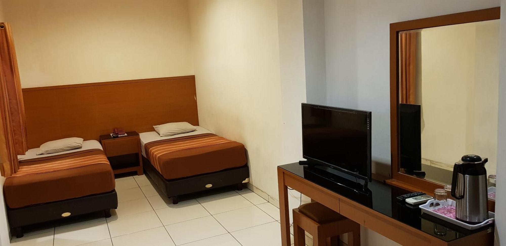 Hotel Dequr Jakarta Kota Rum bild